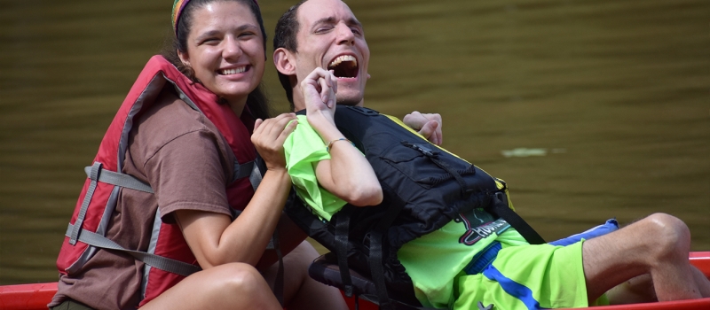 staff member and camper in a kayak